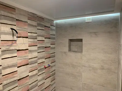 Reforma de baño — ducha y acabados